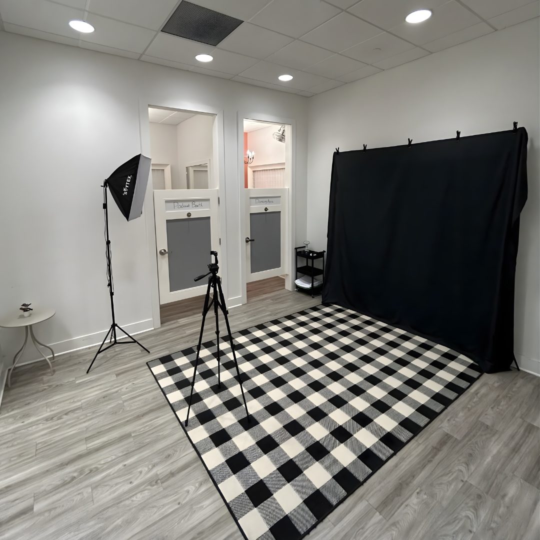 The Photo Studio with a backdrop and studio lighting